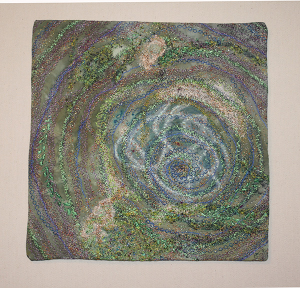 Ozark Springs III, 16 x 16 Hand dyed fabric, hand made paper, painted sheer silk, multiple threads and stitches by hand and machine, slashing, burning and distressing the fabric. Photo: Rosemary Claus-Gray
