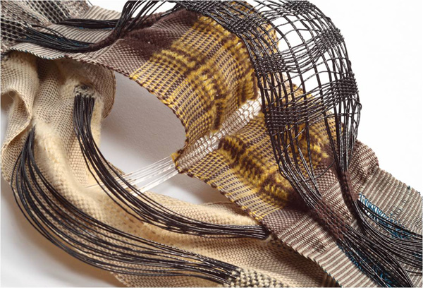 Bridge Series: sample, 2011. Nylon, plastic, wool and fiber optic rods. Multi-layered block-weave structure created on a 24 harness compu-dobby loom. Detail:10" x 6" x 4"