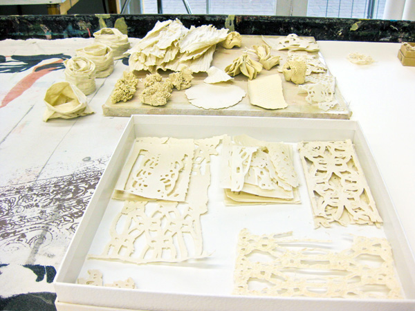 Porcelain Samples for Studio Remix, 2011, Samples, various sizes, Paper cut-outs and raffia coated in slip. Hand molded forms, porcelain. Photograph: Lizz Aston