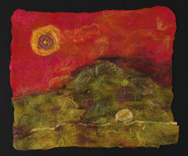 Smoky Hill, 24 H x 24W x 3 D inches, Merino wool, throwsters waste silk, silk roving, cashmere yarn, wrapped Tsumugi silk yarn, synthetic yarn, silk rope, alpaca roving, embedded organics – alder leaves. Technique: handmade felt – wet felting, photo: Shawna Eberl