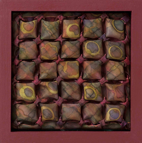 Blocked Circles III, 07/07/11, 13x13x2 cm 100% silk, Fibre reactive Reverse Flower smocking stitch, dyes and wax resist on hand painted silk, photo: Pete Paterson.