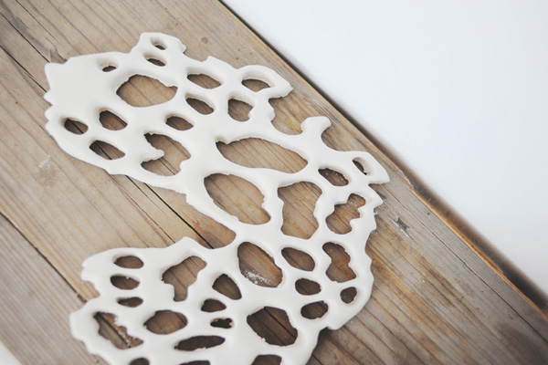 Porcelain Macrame Pattern, 2011, Paper and free-motion embroidery burnt away, Porcelain. 15 cm h x 30.5 cm w, Photograph: Lizz Aston