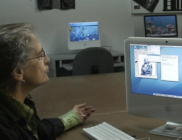 Louise at computer, Photo shot by Patricia Gariépy.