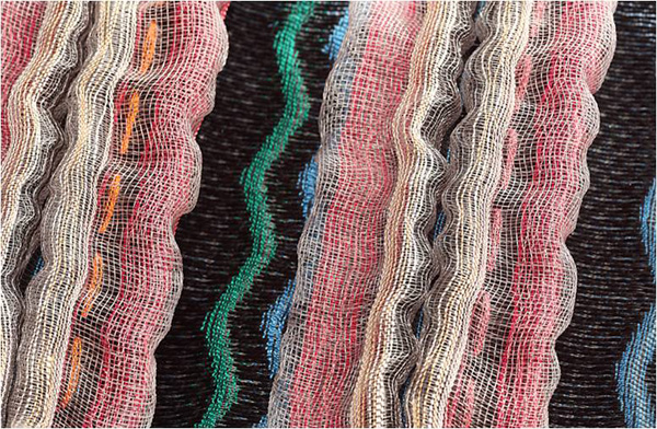 Aquatic Series: sample 3, 2010. Nylon monofilament, plastic, cotton and polyester. Multi-layered block-weave structure created on a 24 harness compu-dobby loom.
Detail: 4 ½ " x 3" x 1"