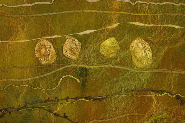 Field: Take a Note (Detail), 2011, 36 H x 22W x 3 D inches, Merino wool, throwsters waste silk, silk roving, cricula silk yarn, cricula cocoons, copper wire, pineapple bark yarn, wrapped Tsumugi silk yarn, synthetic yarn, knitted synthetic yarn, embedded organics – birch bark and appended African porcupine quill. Technique: handmade felt – wet felting, photo: Shawna Eberle