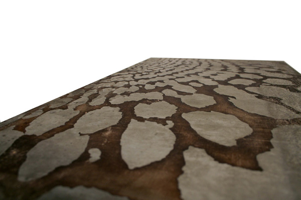 Malbec Etched Table - detail, 2011, Concrete and walnut, acid etched with red wine, 43 cm h x 38 cm w x 75 cm l, Photograph: Jean Willoughby