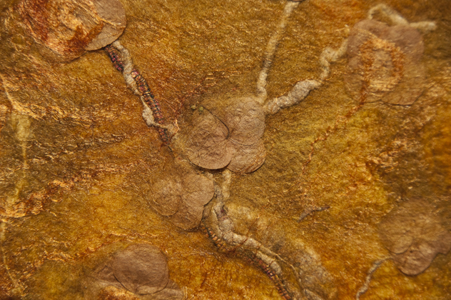 Tree in Bloom IV (Detail), 30 H x 9W x 1 D inches, Merino wool, throwsters waste silk, silk roving, wrapped Tsumugi silk yarn, synthetic yarn, silk rope , embedded organics – dried hydrangea flowers. Technique: handmade felt – wet felting, photo: Rod Trider