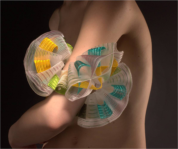 Egg Hunt (modeled), 2007. Nylon monofilament and color coated copper. Quadruple-cloth created on an 8 harness floor loom. 6 ½" x 6 ½" x 6 ½"