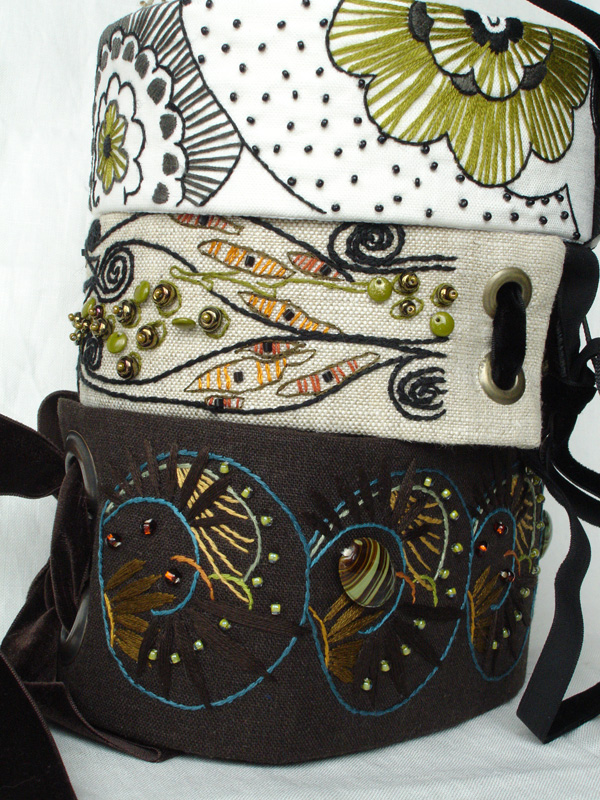 A mix of Belts- various materials, embroidered and beaded 