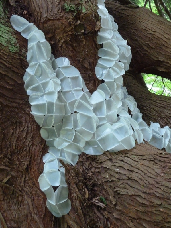 Hive, plastic milk bottles, staples, installation: Matzke Sculpture Park, Camano Island, WA, photo: Barbara De Pirro