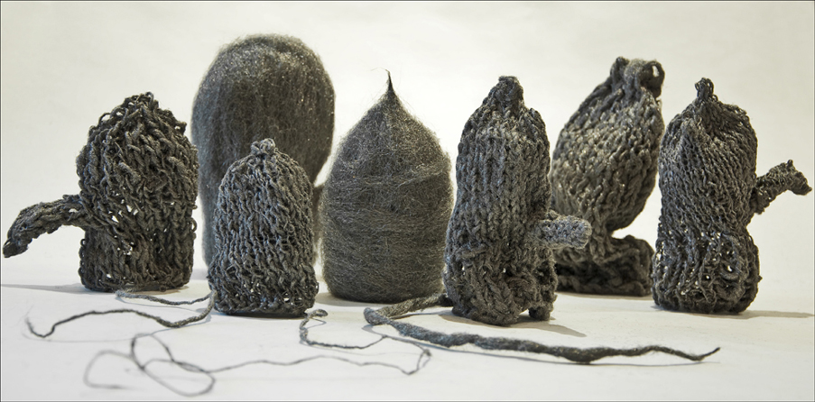 Unbalanced; 2009; dimensions variable (approx 5"x2.5"x2.5" each); steel wool