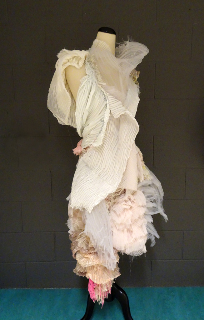 Charlotte Ostergaard: ÆT; 2017, 135 H ☓ 70W ☓ 60D (body size 36/38); satin, organza, chiffon, linen. Techniques: embroidery, knit, rya, crochet and hand-pleating.