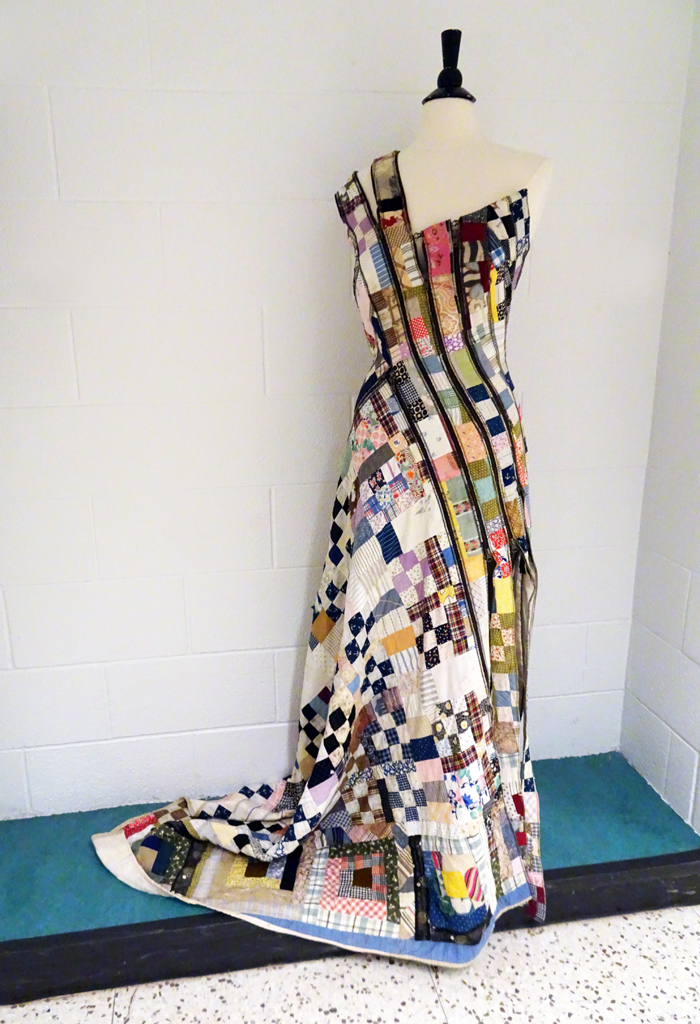 Marty Ornish: Biased, (2018). This media is a 1930’s abandoned cotton quilt.  Does sewing on the bias lead to thinking about Bias. This garment is convertible as well, unzip the skirt and what is left:  a biased tunic, hand woven in the back to obfuscate the original design.