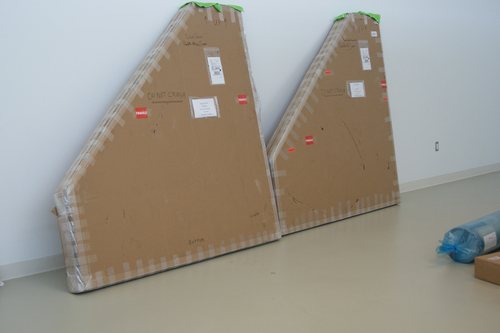 Two large boxes delivered by a courier.