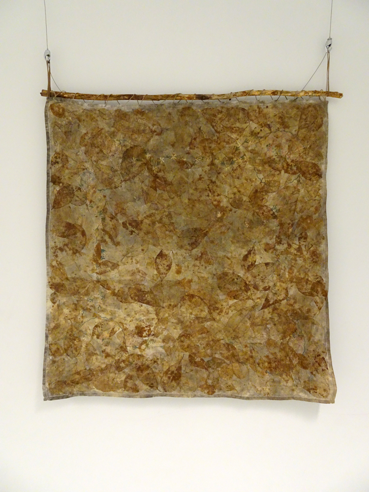 Earth Repair, 92 H x 87 W x 4 D cm, cotton, leaf skeletons, jute, wood, Technique: Tree staining, washing, ironing, hand and machine applique. 