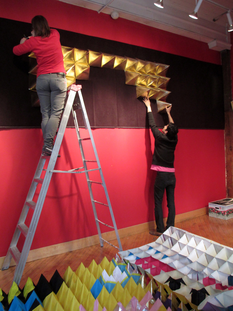 Magda Wojtyra installing her work.