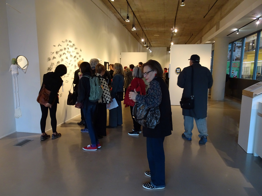 Visitors at the opening of the "me and you" exhibition, World of Threads Festival 2016.
