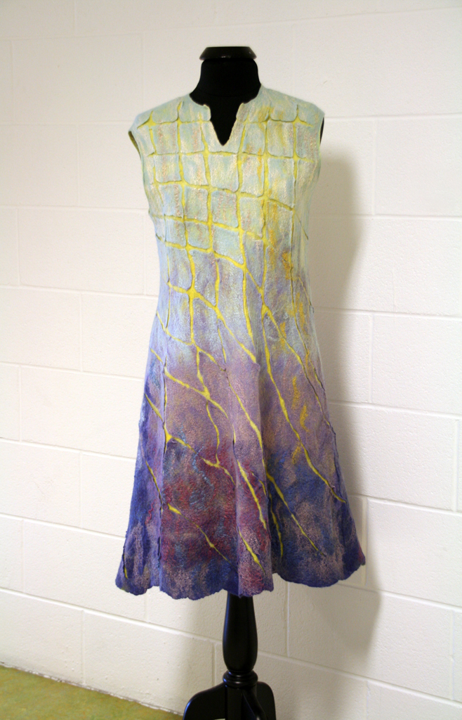 “Sunny rays in water”, 2016, 105 cm H x 70 cm W x 3 cm D (will fit size 12-16), sheep wool, silk fabric. Wet felting, nuno-felting. 