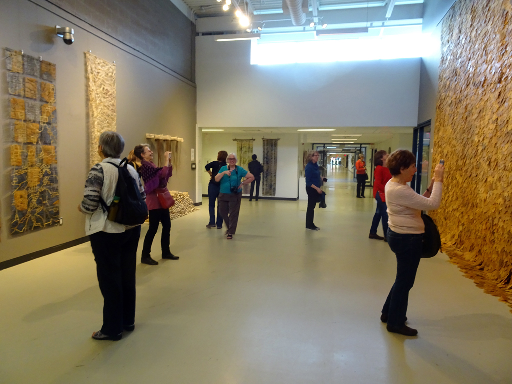 Visitors to Late in the Season exhibition, World of Threads Festival 2016.