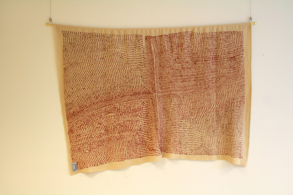 Remembrance, Women's Loss, 2015, 140H x 180W cm. Found wool blanket, found red yarn. Technique: French knots.