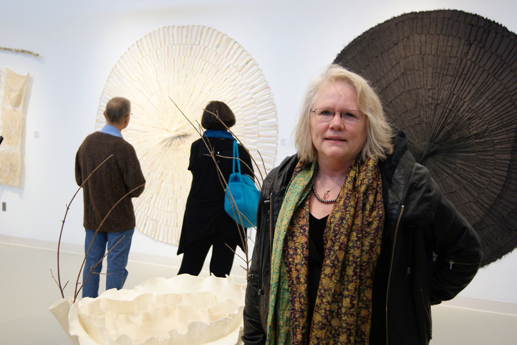 Artist Maggie Tchir at the opening of the Quiet Zone exhibition, World of Threads Festival 2012.