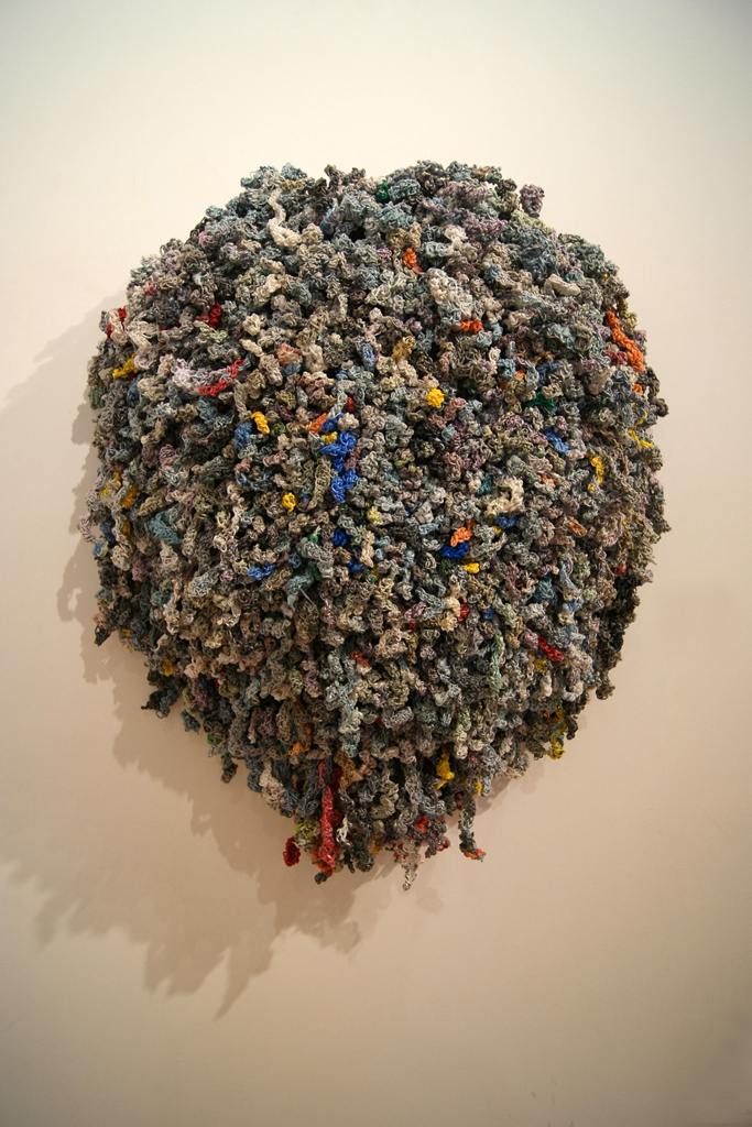 One Day, 2010, Materials:  	Repurposed plastic sleeves from delivered newspapers. Technique:	Handspun, crochet.
