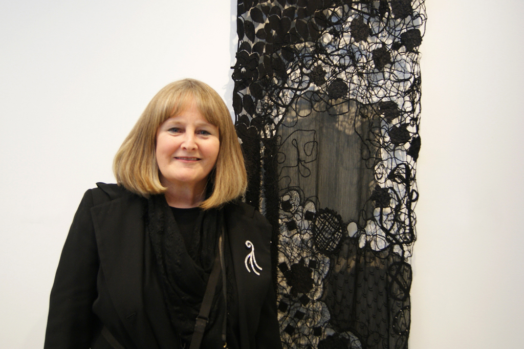 Artist Pat Hertzberg at the opening of the Quiet Zone exhibition, World of Threads Festival 2012.