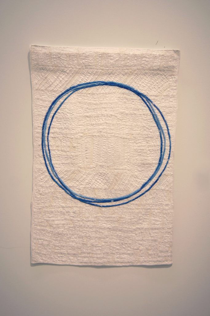 Judy Martin, Trinity. Linen damask, silk, dyed line, hand pieced, hand applique, hand quilted. 22" wide by 30" high, 2011.