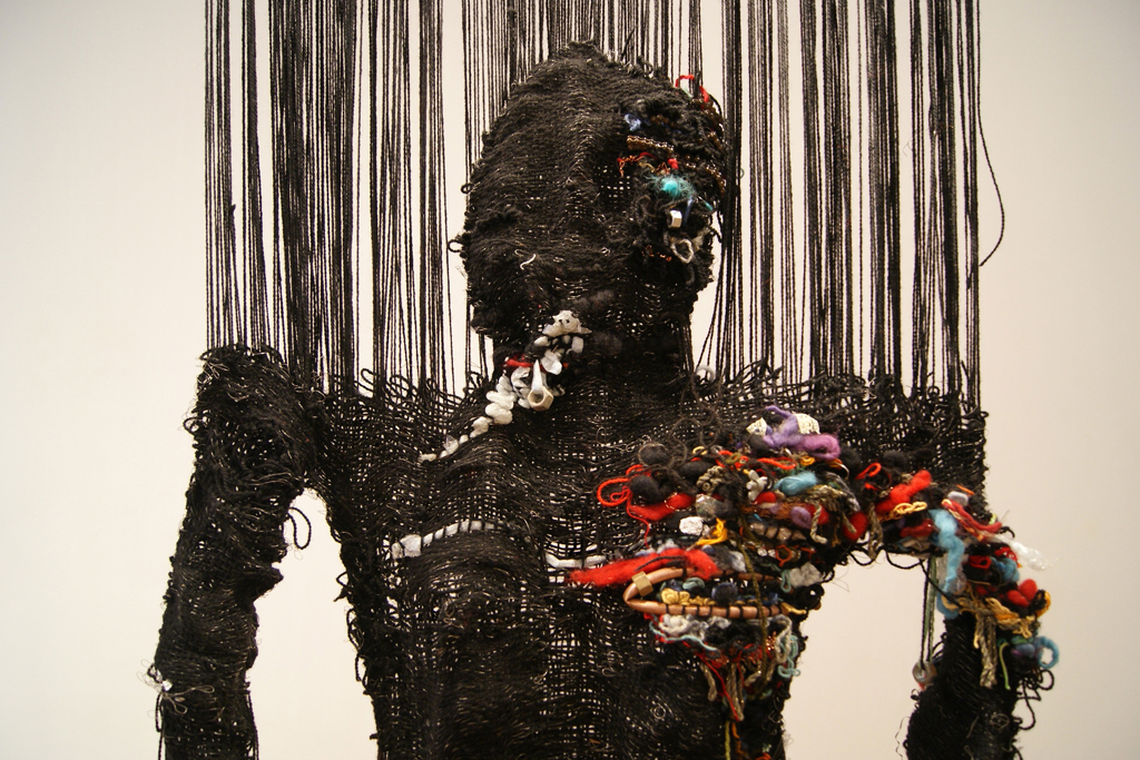 Woman with Two Vices, detail.