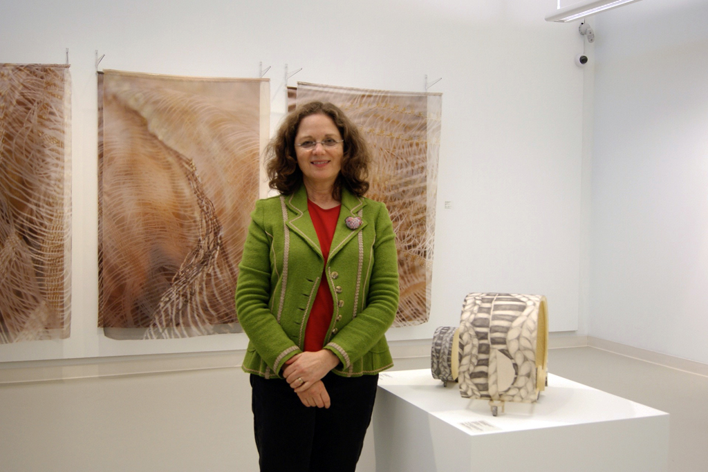 Artist Yael Brotman at the opening of the Quiet Zone exhibition, World of Threads Festival 2012.