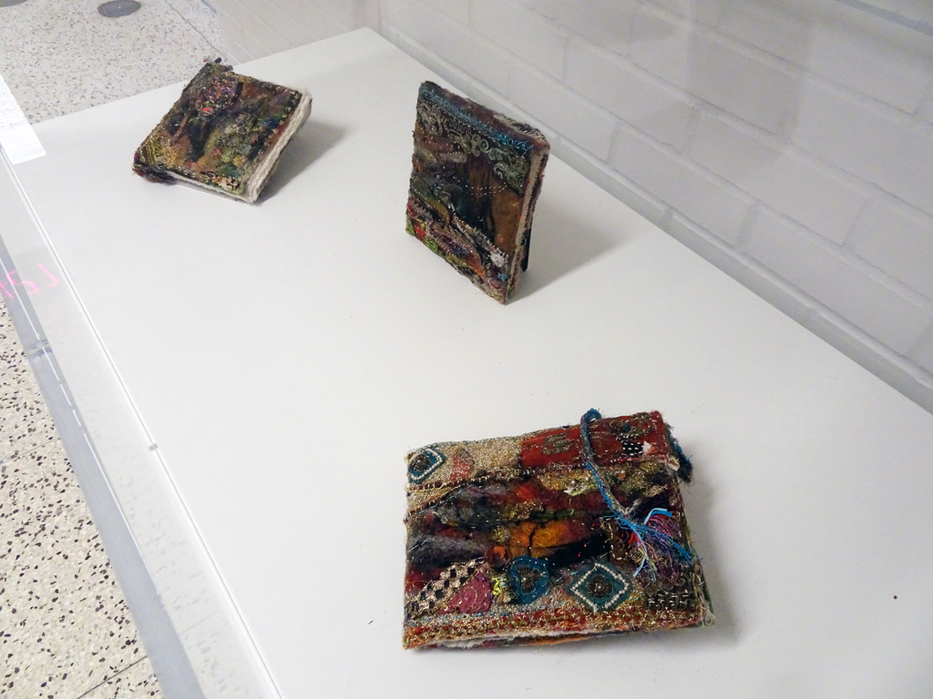 Melanie Siegel: Small Books 1, 2, and 3. Hand stitched, felted, free motion emmbroidery, pearls, vintage fabric.