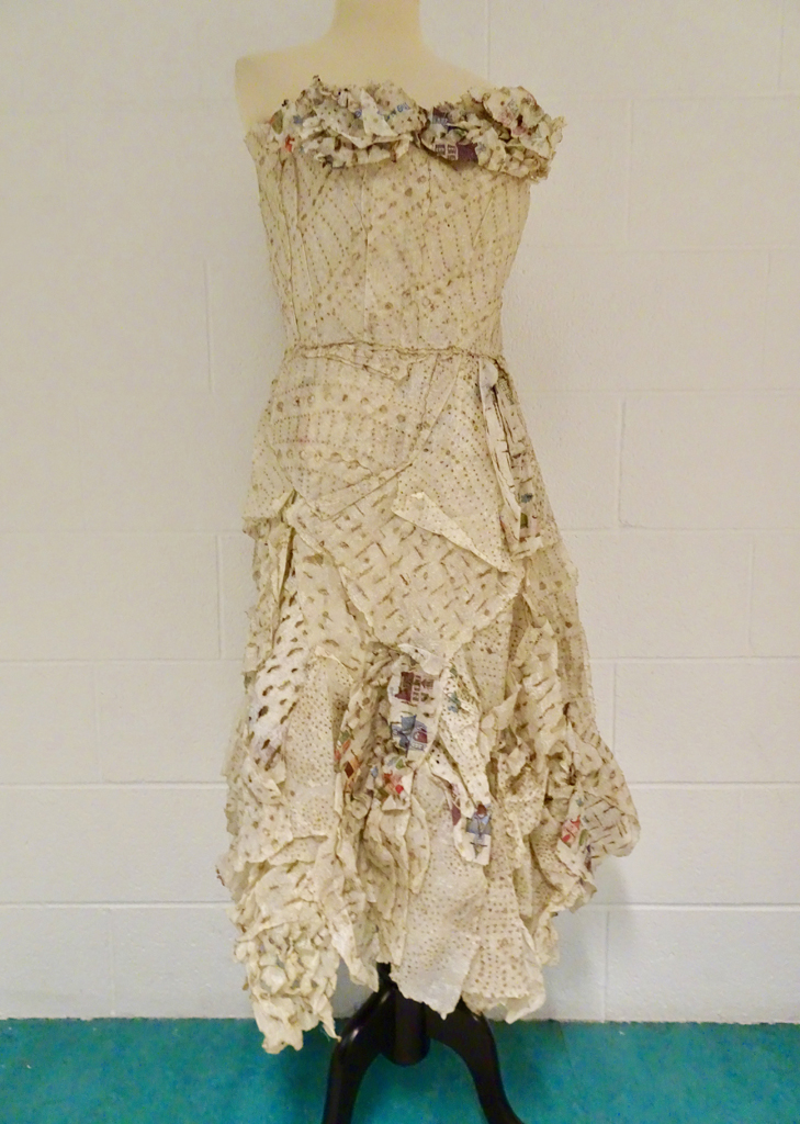 Susan Zimmerman: Housewife's Gown, 2017, 107H x 117W x 66D cm, paper towels, acrylic wax, thread. Technique: incense-burned paper towels, wax coated, crumpled, and hand-sewn together in overlapping layers.