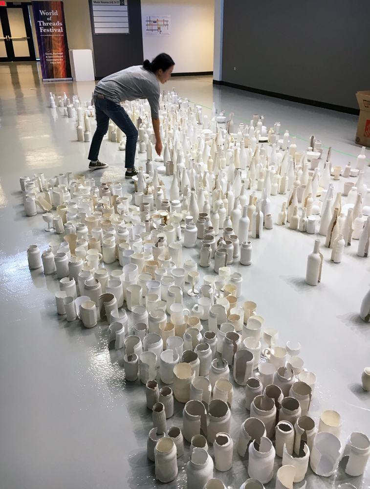 Sun Young Kang, the massive floor installation starts to grow.