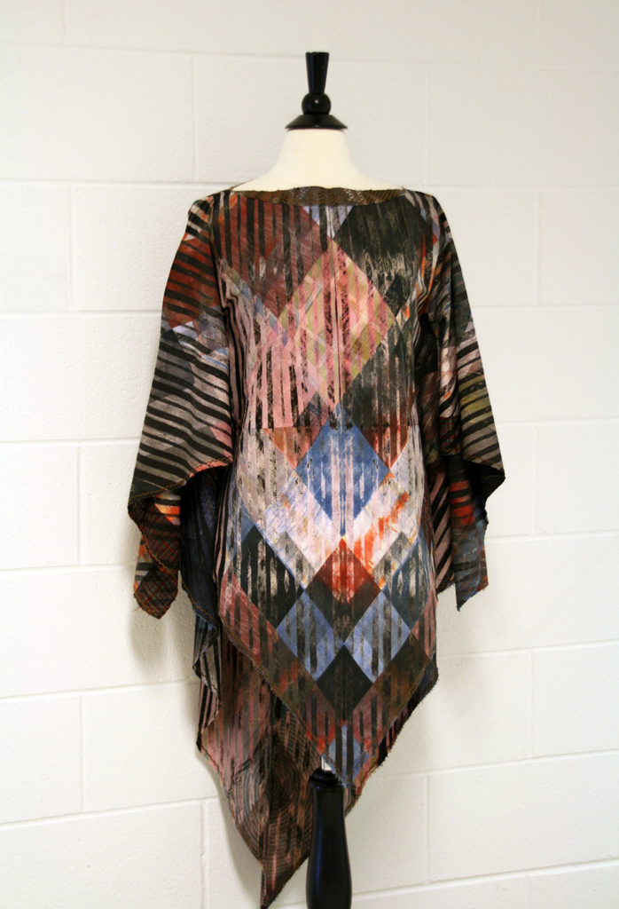 Motley Poncho, 2015, womenswear, cotton, patchwork of ascending rhombic shaped patches, synthetic dyed, Technique: patchwork, stitch-resist, discharge-dyeing, overdyeing, heavy Sashiko on neckline and edges.