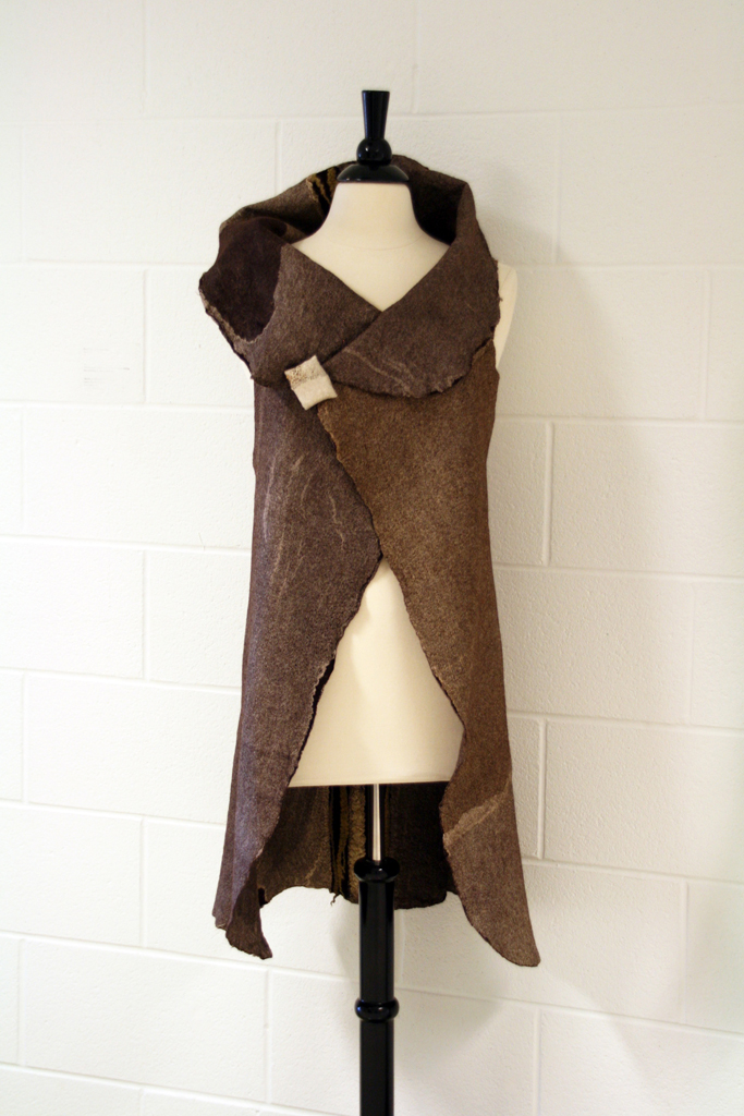 Rust, 2016, 101 H x 115 W cm, silk, silk organza, merino wool, rusted pipe, eucalyptus, Technique: hand-dyed nuno felt, eco-printing, hand stitching. 