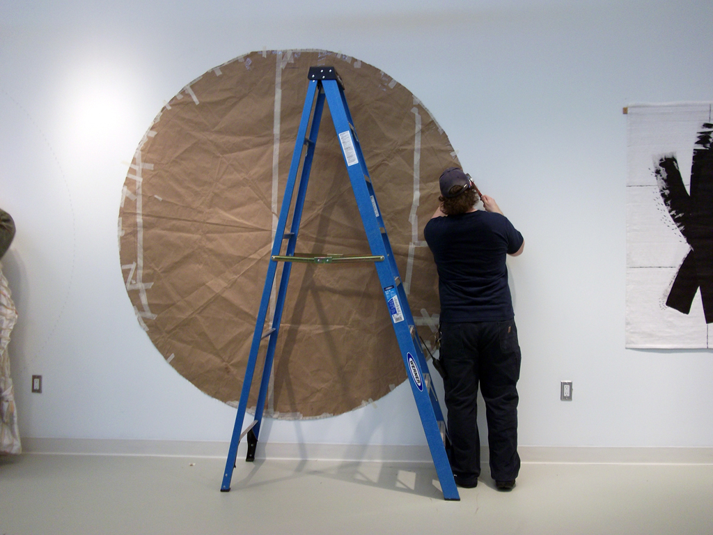 Starting the install of Lisa DiQuinzio's artwork. 