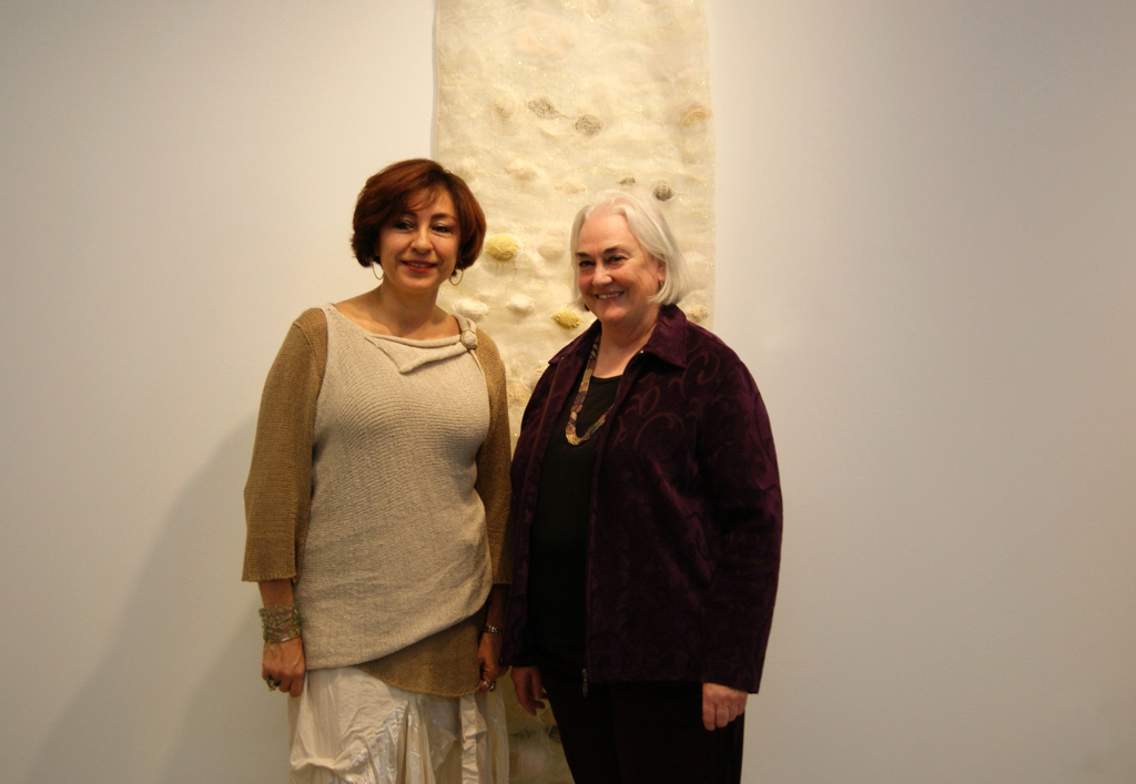 Artist Ixchel Suarez and curator Dawne Rudman at the Quiet Zone exhibition, World of Threads Festival 2012.