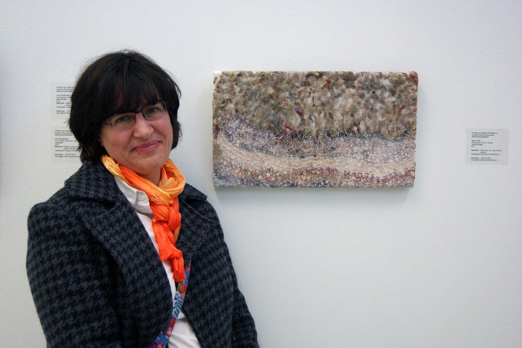 Artist Nancy Yule at the opening of the Quiet Zone exhibition, World of Threads Festival 2012.