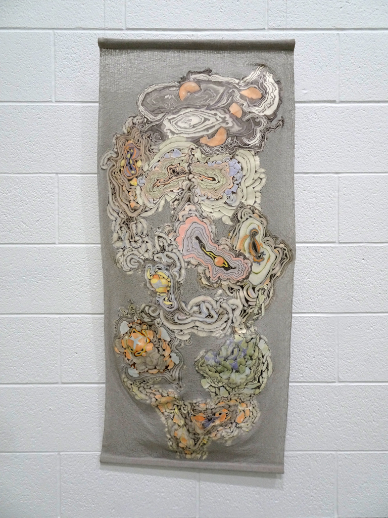 Szilvia Revesz: Philosopher’s Stone, 2017. Medium: sumi ink and fabric dye on paper, Evolon (split microfiber) paper backing, polyester thread, silk thread.
Technique: Suimonga monotype printed on paper, machine stitched connecting web created on water-soluble material
Dimensions: (49”x27.5”x0.5”) Mounted.