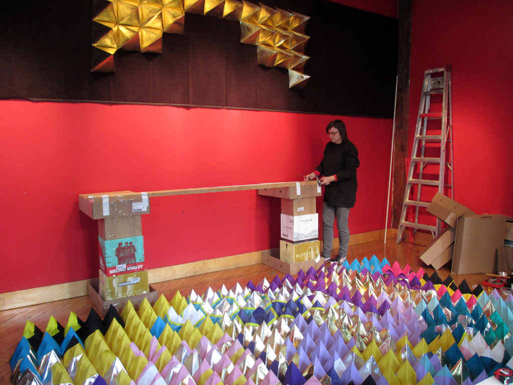 Magda Wojtyra installing her work.