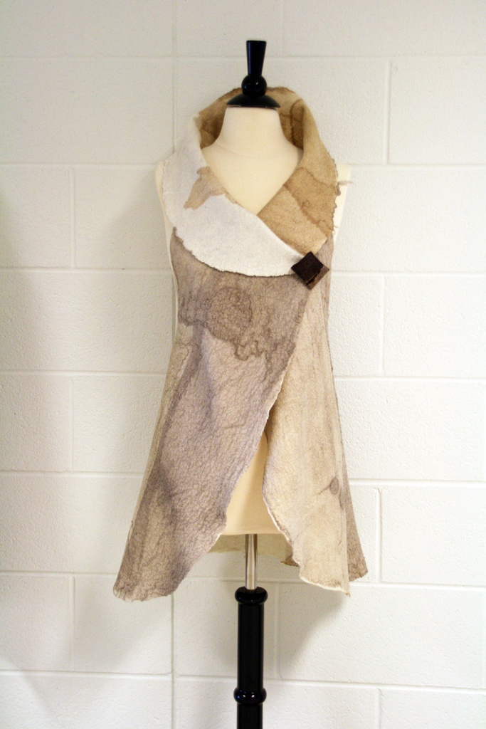 Wait…Don’t go, 2016, 101 H x 115 W cm, silk, merino wool, cotton gauze, rusted bolts, rusted dyed cotton thread, hand dyed silk thread, Technique: hand-dyed nuno felt, hand stitching. 