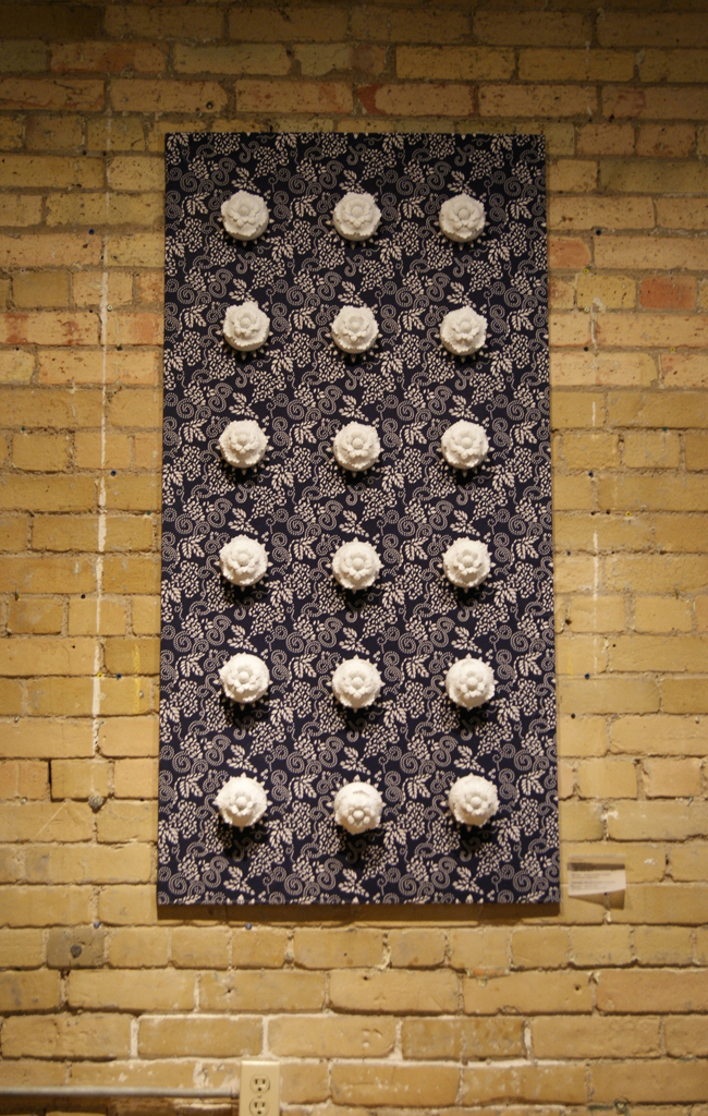Flower Series #2, 2011,       Porcelain and Fabric,           140x70x7.5 cm. Hand-build, commercial reproduced vintage                                                                            fabric.
