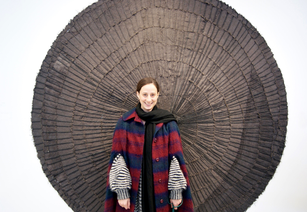 Artist Lisa DiQuinzio at the opening of the Quiet Zone exhibition, World of Threads Festival 2012.