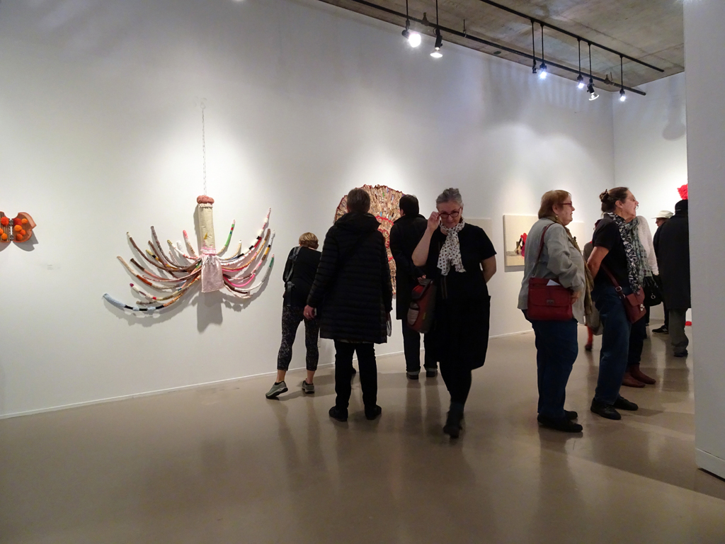 Visitors at the opening of the "me and you" exhibition, World of Threads Festival 2016.