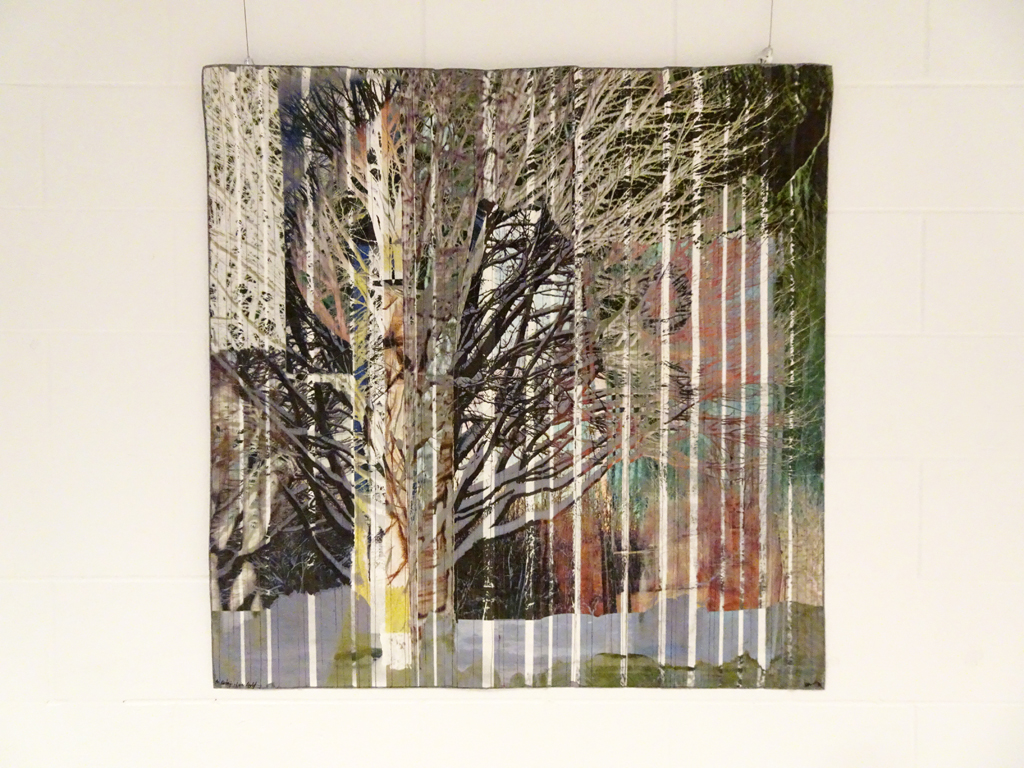 Wen Redmond: The Content of the Light,
art is timeless, 40x40,
Medium- Mixed Media Digital Fiber- Lutrador, interfacing, digital photograph and printing, paint, and satin varnish
Technique- Melding photographs creates the final photograph, printed both on an interfacing and inkjet ready lutrador. Lutrador was sliced, overlaid, and stitched. Edges are painted and top is sealed with satin varnish. 	