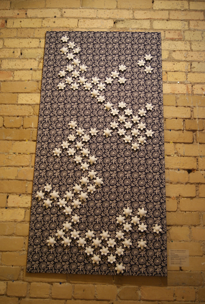 Flower Series #4, 2011,       Porcelain and Fabric,           140x70x3.5 cm. Hand-build, commercial reproduced vintage                                                                            fabric.