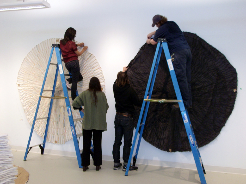 Installing the artwork of Lisa DiQuinzio, under her supervision.