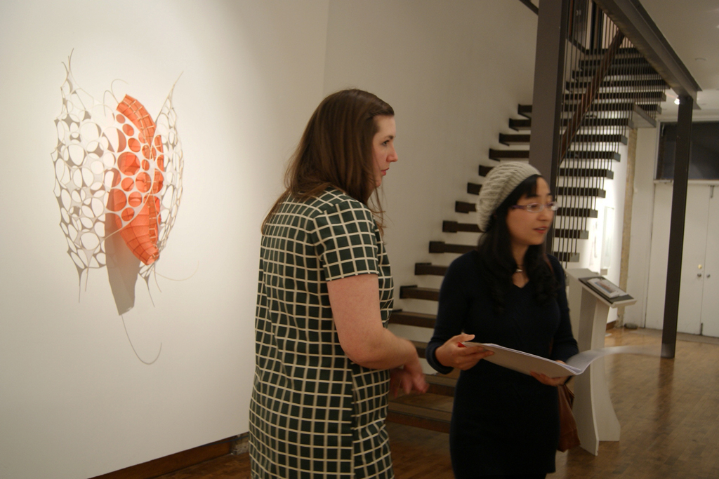 Curator: Stanzie Tooth, and Artist: Xiaojing Yan at the opening of the Material Connections exhibition, World of Threads Festival 2012.