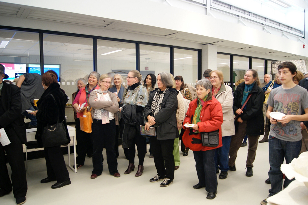 Artists and visitors at the Quiet Zone exhibition, opening reception, World of Threads Festival 2012.