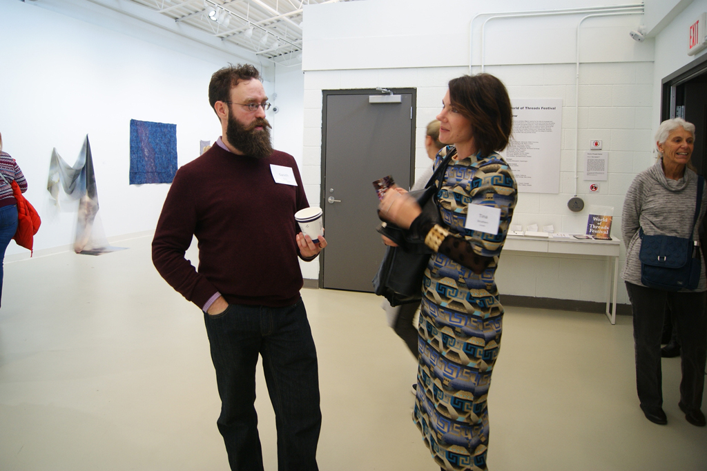 Festival Curator, Gareth Bate chatting to artist, Tina Struthers.